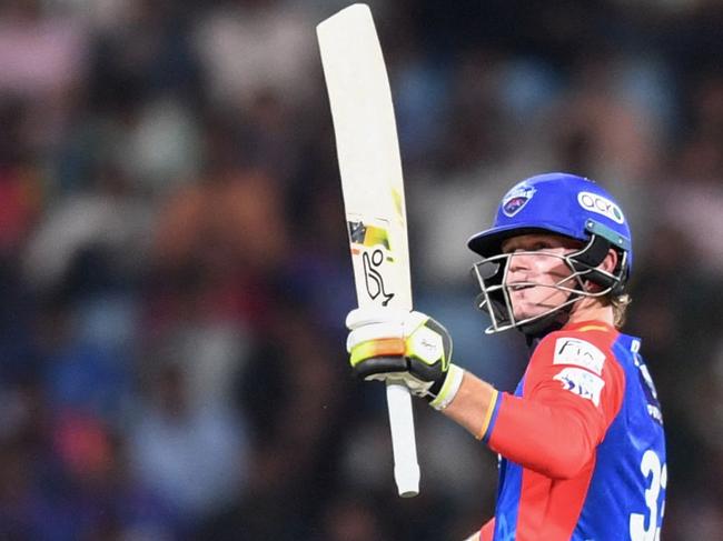 Delhi Capitals' Jake Fraser-McGurk celebrates after scoring a half-century (50 runs) during the Indian Premier League (IPL) Twenty20 cricket match between Lucknow Super Giants and Delhi Capitals at the Ekana Cricket Stadium in Lucknow on April 12, 2024. (Photo by Noah SEELAM / AFP) / -- IMAGE RESTRICTED TO EDITORIAL USE - STRICTLY NO COMMERCIAL USE --