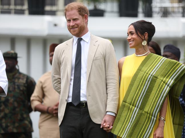 Prince Harry and Meghan Markle visit the Lagos State Governor. Picture: AFP