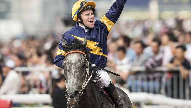 HONG KONG - MAY 01: Tommy Berry riding Chautauqua (C) celebrates after winning The Chairman's Sprint Prize race at Sha Tin Racecourse on May 1, 2016 in, Hong Ko (Photo by Victor Fraile/Getty Images)