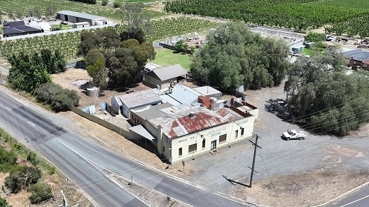 The Pine Lodge Hotel and Hostel is up for sale.
