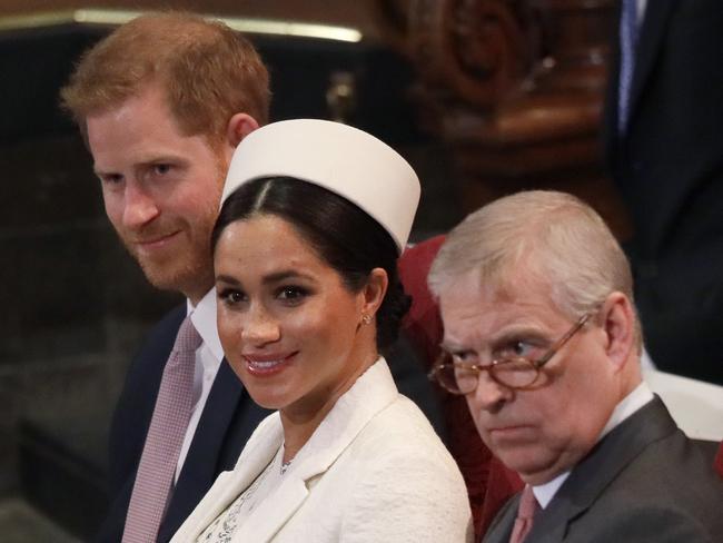 Meghan, Duchess of Sussex sits with Prince Harry, left, and Prince Andrew, right, during the Commonwealth Service at Westminster Abbey in London, Monday, March 11, 2019. Commonwealth Day has a special significance this year, as 2019 marks the 70th anniversary of the modern Commonwealth - a global network of 53 countries and almost 2.4 billion people, a third of the world's population, of whom 60 percent are under 30 years old. (AP Photo/Kirsty Wigglesworth, Pool)