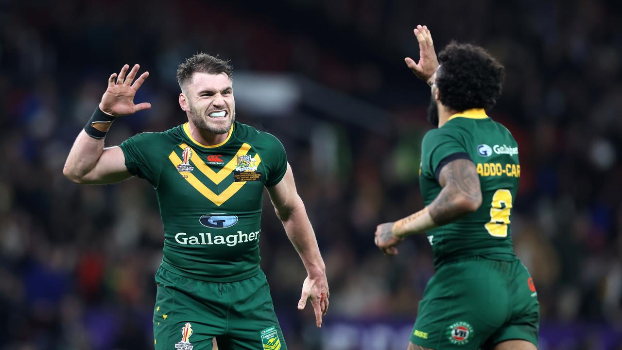 Josh Addo-Carr of Australia celebrates with teammate Angus Crichton after scoring their sides third try during the Rugby League World Cup Final match. (Photo by Naomi Baker/Getty Images)