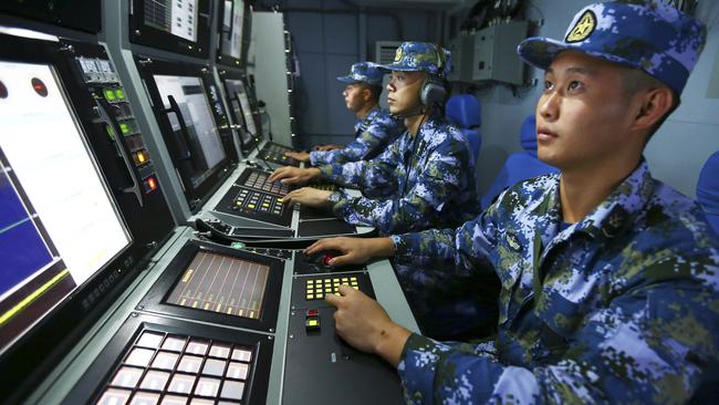 China will spend $275bn on defence this year, former defence minister Christopher Pyne told Adelaide uni students this week. Pictured are Chinese naval personnel during exercises in the South China Sea. Picture: Zha Chunming/Xinhua via AP