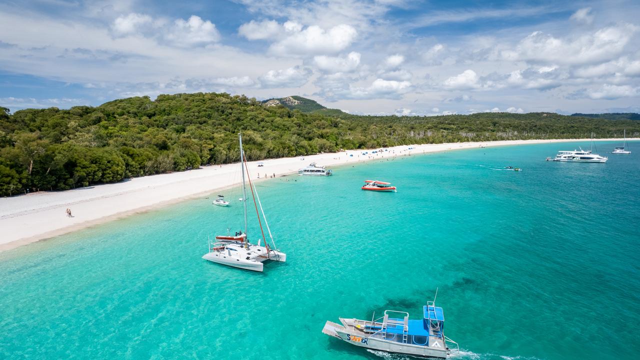 Beachfront camping on Whitsunday Island – Whitehaven Beach. Photo: Mark Fitz Escape – Meet the Guide – Tony Ritter Credit: Tourism & Events Queensland