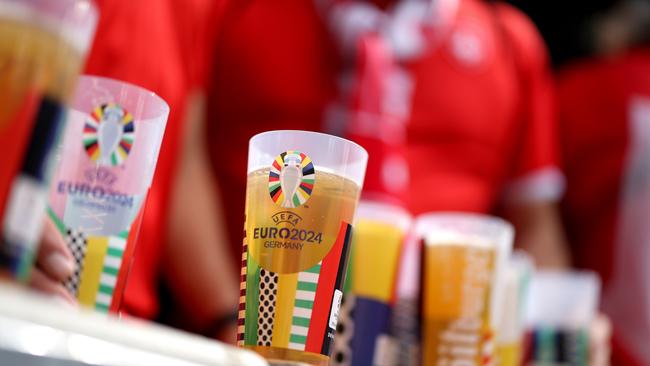 Fans drinking beer at the UEFA EURO 2024 quarter-final match between England and Switzerland. Picture: Carl Recine/Getty Images