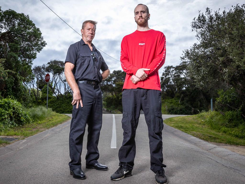 Peter Meuleman and his son Ryan stand on the spot where Ryan was hit while riding his bike. Picture: Jake Nowakowski