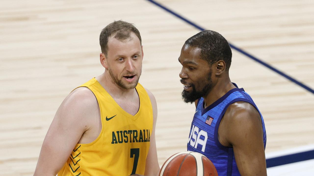 LAS VEGAS, NEVADA - JULY 12: Joe Ingles #7 of the Australia Boomers talks with Kevin Durant #7 of the United States after Ingles fouled Durant during an exhibition game at Michelob Ultra Arena ahead of the Tokyo Olympic Games on July 12, 2021 in Las Vegas, Nevada. Australia defeated the United States 91-83. (Photo by Ethan Miller/Getty Images)