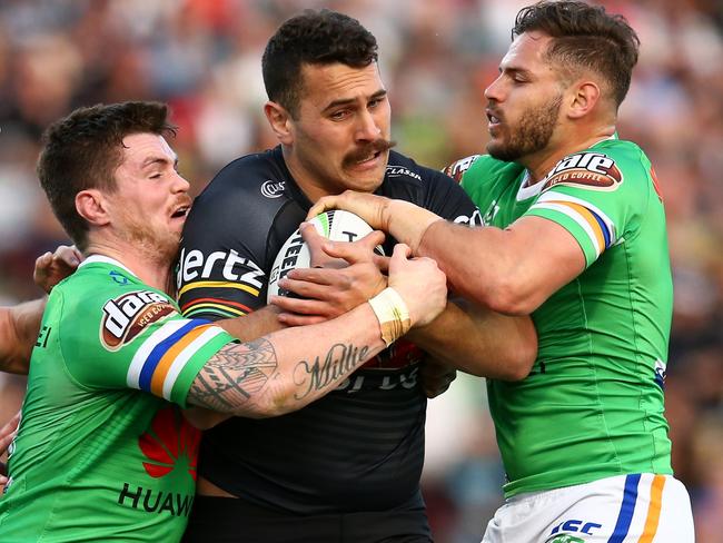 PENRITH, AUSTRALIA - JULY 28: Reagan Campbell-Gillard of the Panthers is tackled during the round 19 NRL match between the Panthers and Raiders at Panthers Stadium on July 28, 2019 in Penrith, Australia. (Photo by Jason McCawley/Getty Images)