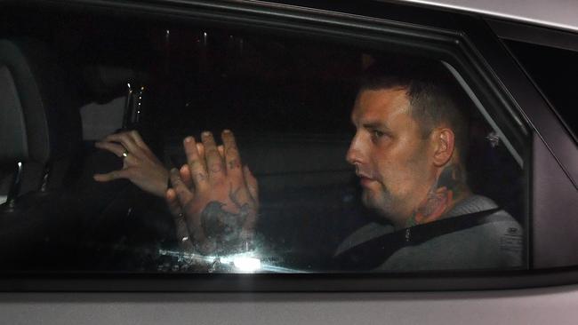 Zlatko Sikorsky, 34, is taken to Maroochydore Police Station, after his surrender on Saturday night. Picture: AAP/Darren England