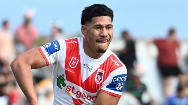 CAIRNS, AUSTRALIA - AUGUST 12: Talatau Amone of the Dragons passes the ball during a round 24 NRL match between South Sydney Rabbitohs and St George Illawarra Dragons at Barlow Park on August 12, 2023 in Cairns, Australia. (Photo by Emily Barker/Getty Images)