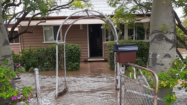 A house in Jandowae inundated with floodwaters after heavy rains hit the Western Downs region. Picture: John Eather