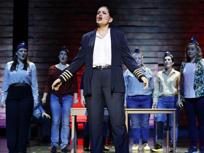 The Cairns Choral Society will perform the musical Come From Away at the Cairns Performing Arts Centre from January 10 to 18. Cairns Choral Society's Yasmine Croghan performs as an airline pilot in the musical Come From Away. Picture: Brendan Radke