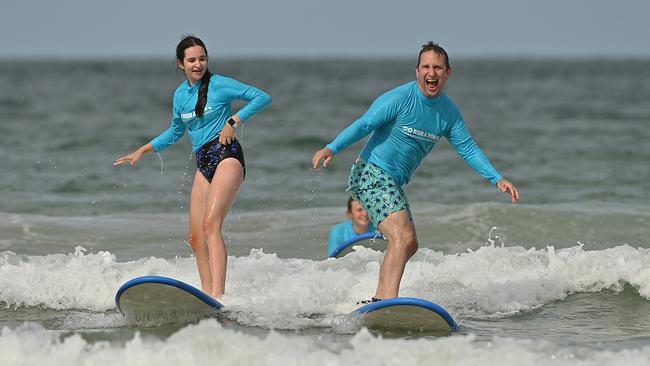 Gary McGraw with daughter Maddie at the spit, Noosa.