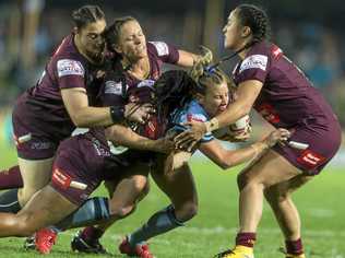 Sam Bremner of the Blues is tackled during the Women's State of Origin match between the NSW Blues and Queensland Maroons at North Sydney Oval in Sydney, Friday, June 22, 2018. (AAP Image/Craig Golding) NO ARCHIVING, EDITORIAL USE ONLY. Picture: CRAIG GOLDING