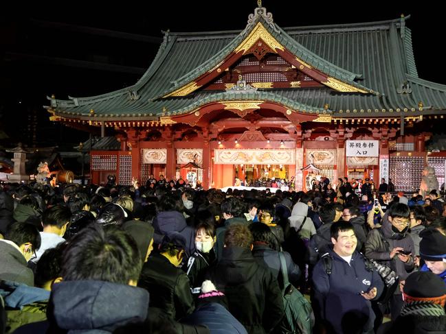 People visit Kanda Myojin Shrine to offer New Year prayers in Tokyo. Picture: AFP