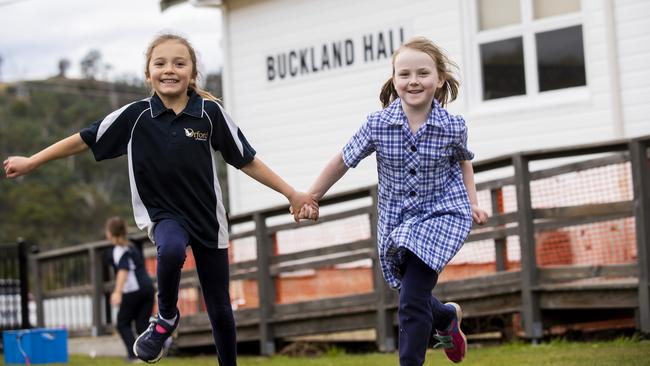 Students Bella Press 7 and Bridee Schuppan 6. Buckland satellite school for students who currently can't get to school at Orford Primary School due to the road closure. Picture: Richard Jupe