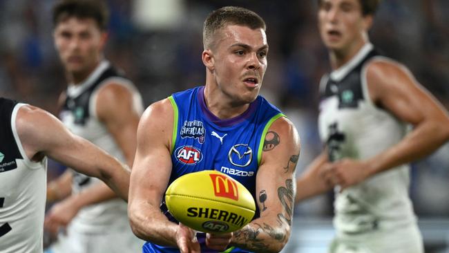 Larkey was firm on why he wanted to stay at Arden Street but said the same reasoning wasn’t neccessarily right for Cam Zurhaar (pictured) when he made his decision. Picture: Quinn Rooney / Getty Images