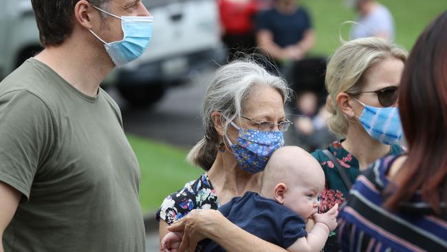 Scenes like these from earlier this year will now be repeated across all real estate transactions in SEQ with masks now mandatory indoors. Picture: Annette Dew.