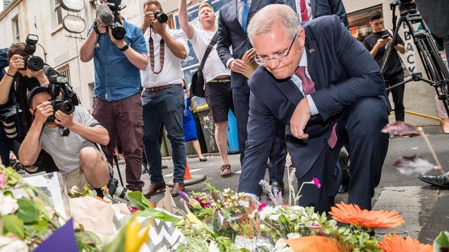 Prime Minister Scott Morrison pays his respects at Pellegrini's Espresso Bar in Melbourne after co-owner Sisto Malapina was killed in a terrorist attack. Picture: Jake Nowakowski