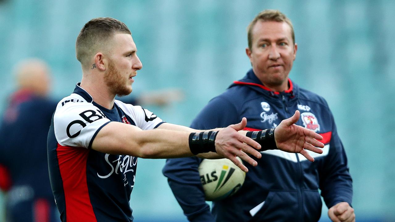 Roosters Jackson Hastings and Roosters coach Trent Robinson during the Sydney Roosters training session at Allianz Stadium , Moore Park .Picture Gregg Porteous