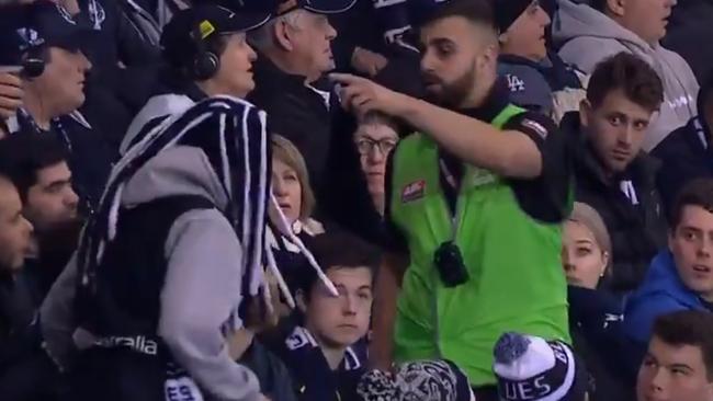 Carlton fans being escorted out by security from Marvel Stadium. Picture: Channel 7