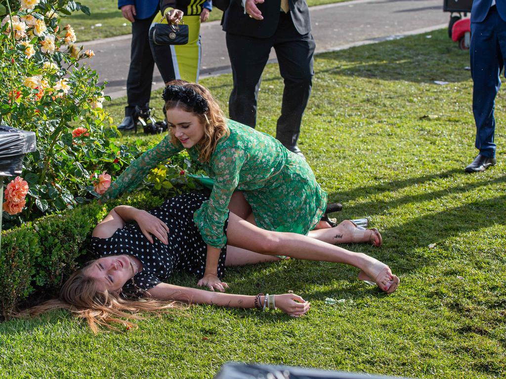 Two ladies having a rest on the grass. Picture: Jason Edwards