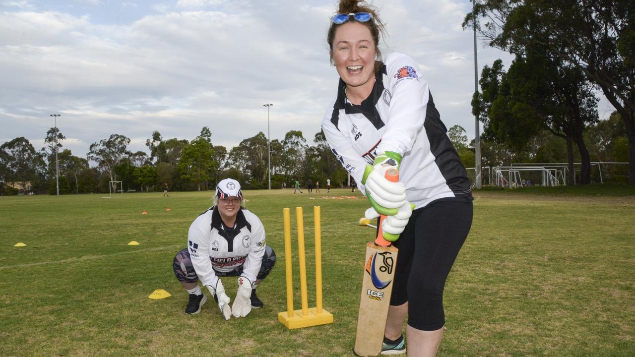 April Lancaster-Smith and Abi McCray are encouraging all interested women to have a go and come play a game of cricket with the Toowoomba Women's Social Group. Thursday, January 12, 2023. Picture: Morgan Burley