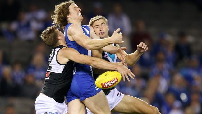 Ben Brown is sandwiched between two Port Adelaide defenders. Picture: Michael Klein