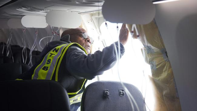 A preliminary report on the Alaska Airlines’ door plug blowout has found four bolts meant to secure the feature were missing. Picture: NTSB/AFP