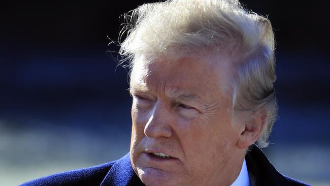 President Donald Trump walks on the South Lawn as he leaves the White House in Washington. Picture: AFP