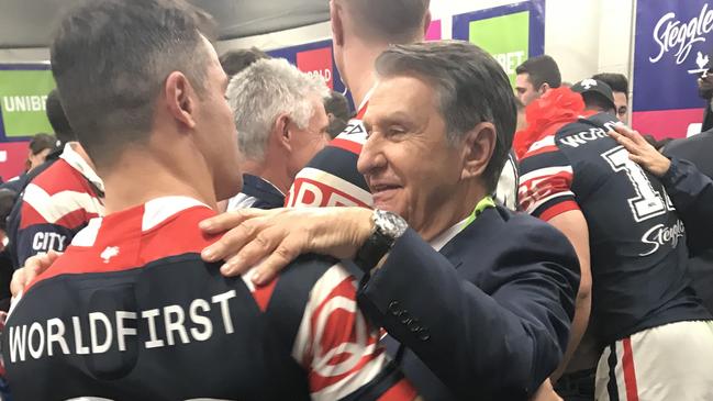 Nick Politis with Cooper Cronk in the Roosters changeroom.