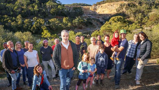 Local residents and members of the group Residents Against White Rock Quarry in Horsnell Gully Conservation Park, with Jim Bastiras, centre. The park overlooks the expanding Hanson White Rock Quarry. Pictures: Russell Millard