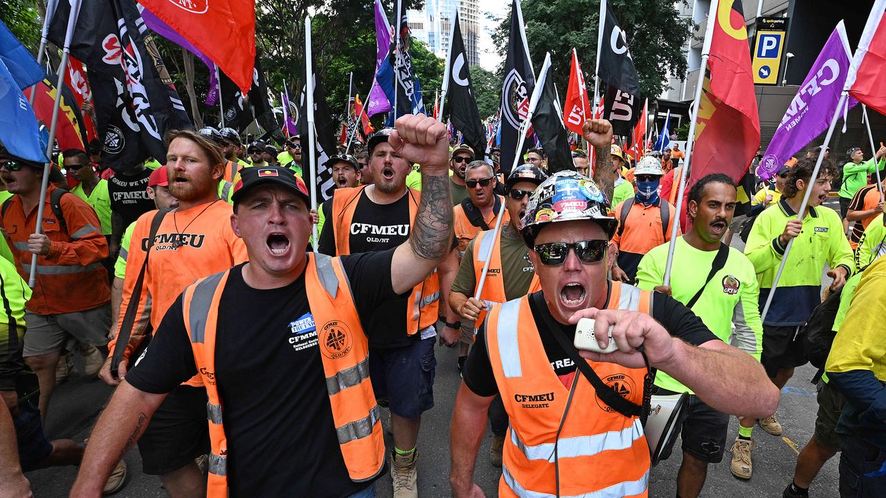 05/04/2023: Thousands of CFMEU union members march in a protest from Queens Gardens to the Federal offices at Waterfront Place, where a glass door was broken and windows were pounded by fists and hands,  Brisbane.  pic Lyndon Mechielsen/Courier Mail