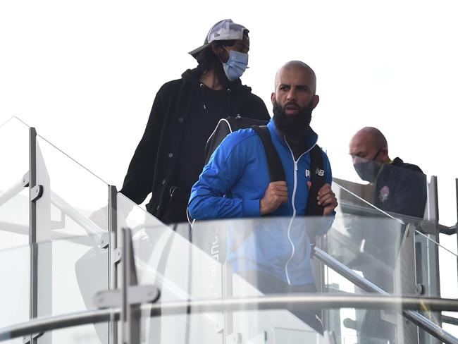 Haseeb Hameed and Moeen Ali of England leave Old Trafford with their kit bags. Picture: Nathan Stirk/Getty Images