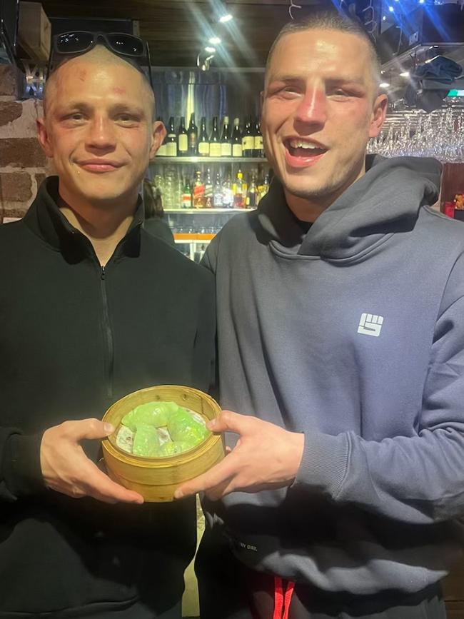 Nikita Tszyu and Koen Mazoudier sharing dumplings after the fight