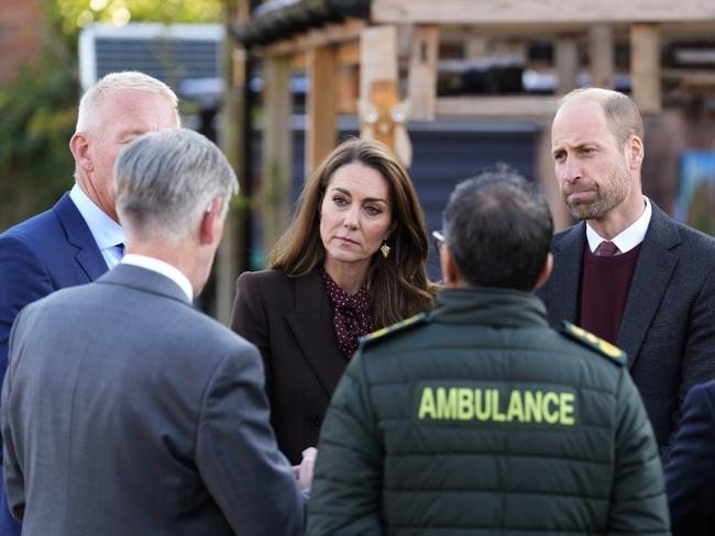 Prince William and Princess Catherine speak with members of the Emergency Services during a visit to Southport Community Centre. Picture: Getty Images.