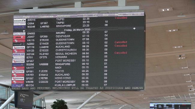 Cancelled flights on display at Brisbane International Airport. Photographer: Liam Kidston.