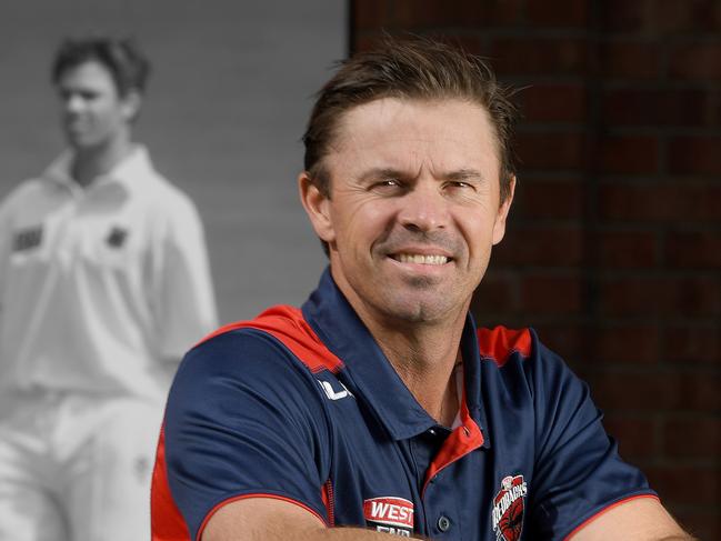 9/8/17 -  Former test cricketer Greg Blewett  is the new Redbacks' batting and U19 coach pictured with a photo of himself during his playing days at Adelaide Oval. Photo Naomi Jellicoe