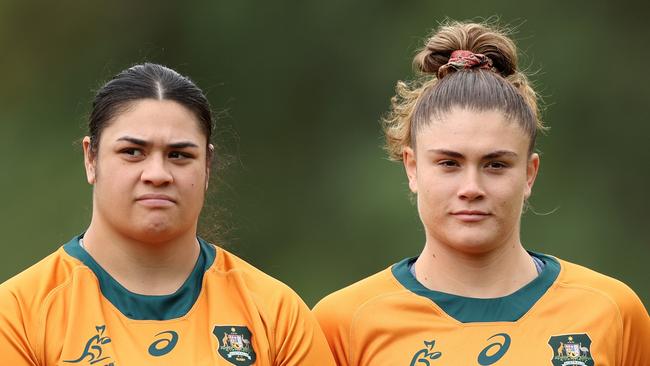 Eva Karpani (L) and Piper Duck (R) look on during an Australian Wallaroos captain's run at Sydney Grammar School in May. Picture: Matt King/Getty Images