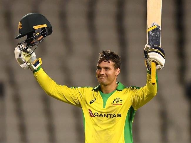 MANCHESTER, ENGLAND - SEPTEMBER 16: Alex Carey of Australia celebrates reaching his century  during the 3rd Royal London One Day International Series match between England and Australia  at Emirates Old Trafford on September 16, 2020 in Manchester, England. (Photo by Gareth Copley/Getty Images for ECB)