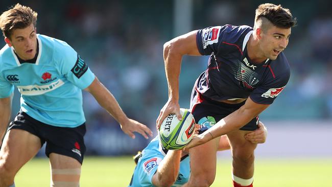 SYDNEY, AUSTRALIA — MARCH 18: Jack Maddocks of the Rebels looks to offload during the round five Super Rugby match between the Waratahs and the Rebels at Allianz Stadium on March 18, 2018 in Sydney, Australia. (Photo by Mark Metcalfe/Getty Images)