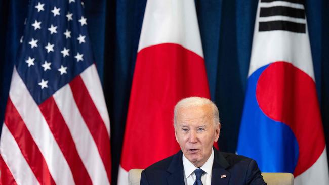 Joe Biden speaks during a trilateral meeting with Japanese prime minister Ishiba Shigeru and South Korean president Yoon Suk Yeol on the sideline of the APEC summit in Lima, Peru. Picture: Saul Loeb / AFP