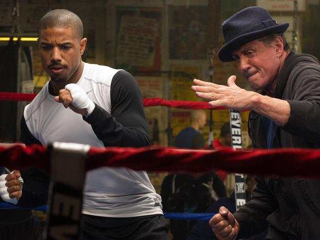 Film Name: CREED Copyright: © 2015 METRO-GOLDWYN-MAYER PICTURES INC. AND WARNER BROS. ENTERTAINMENT INC. Photo Credit: Barry Wetcher Caption: (L-r) MICHAEL B. JORDAN as Adonis Johnson and SYLVESTER STALLONE as Rocky Balboa in Warner Bros. Pictures' and Metro-Goldwyn-Mayer Pictures' drama 