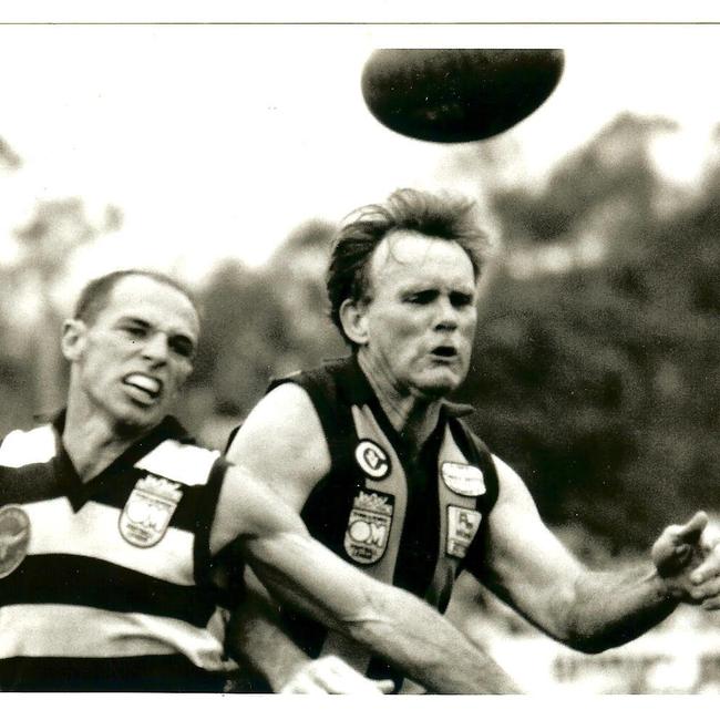 Four-time Wangaratta Rovers coach Laurie Burt, right.