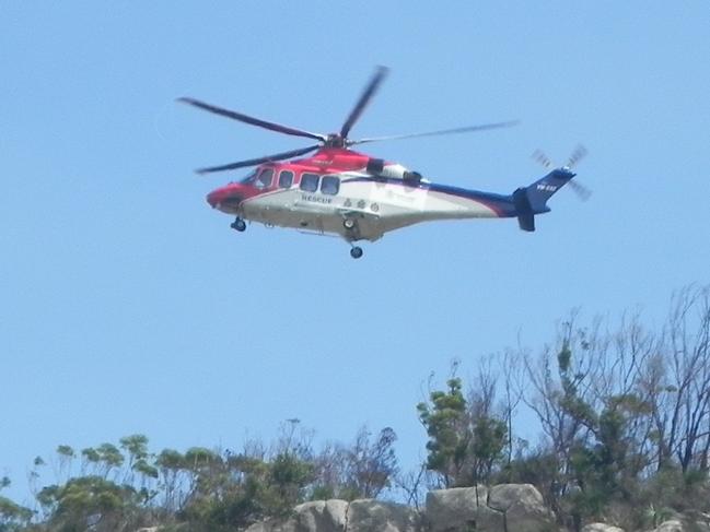 RESCUE MISSION: The Rescue 500 helicopter from Brisbane was called on to winch a bush walker off Mt Walsh at Biggenden on Sunday.Photo Contributed