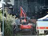 Excavator combs ruins as two feared dead in blaze