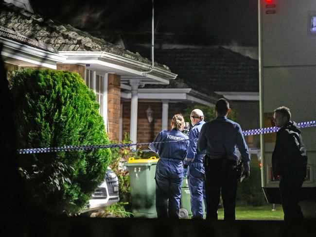 Forensics and detectives at the scene of Zhou’s death in Nunawading. Picture: Sarah Matray