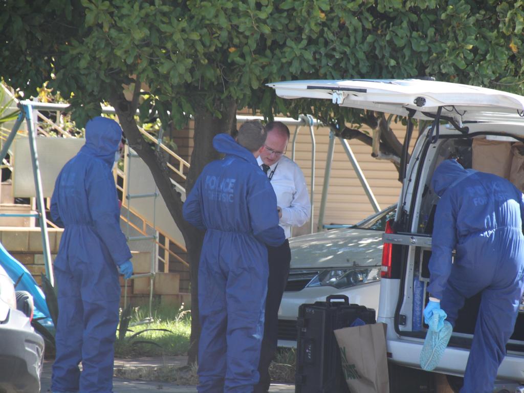 Police officers inspect the scene in Morley. Picture: NCA NewsWire / Anthony Anderson