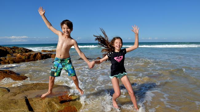 Luke, 9, and Jessika, 10, Gavel of Yandina enjoy at day at the beach at Point Perry.