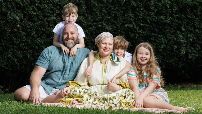 Miriam Gard was diagnosed with stage 3C ovarian cancer 12 months after undergoing a preventive hysterectomy, pictured at home with husband, David, and kids, Nicholas, 5, Christian, 7, and Genevieve, 10. Picture Lachie Millard